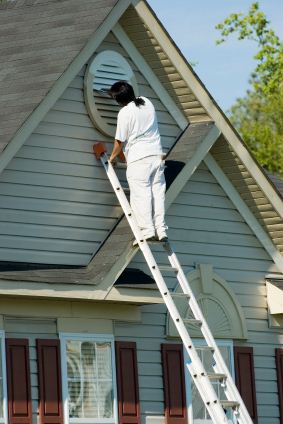 Exterior Painting being performed by an experienced A Brush of Color Inc painter.